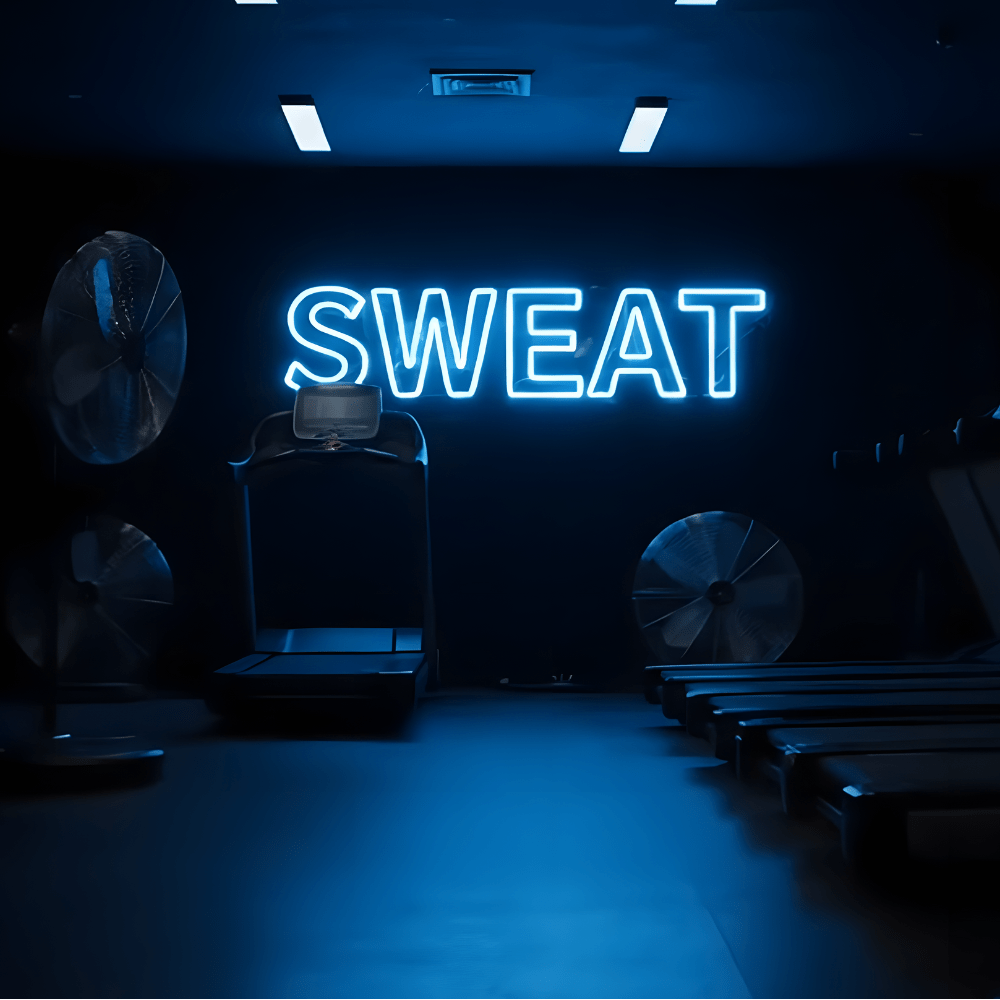 Custom LED neon sign in a modern gym or fitness studio – ideal for home gyms, personal training spaces, and fitness branding in Australia.